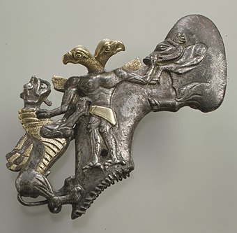Axe with eagle-headed demon & animals; late 3rd millennium-early 2nd millennium BC; gilt silver; length: 15 cm; Metropolitan Museum of Art (New York City)
