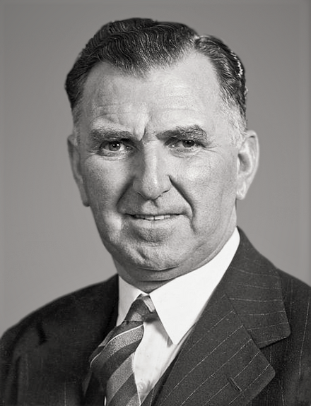 black and white portrait photo of a man aged 60