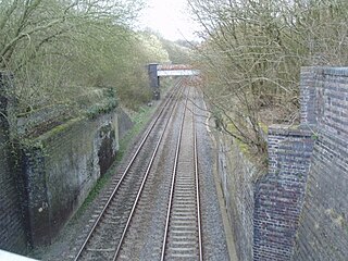 The present Chiltern Main Line passing the bridge piers of the Brill Tramway's former Wood Siding in 2005