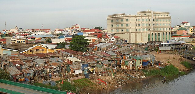 Shanty town beside water