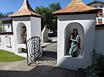 Cemetery including cemetery gate