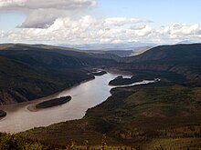 The Yukon River, as seen from the Midnight Dome in Dawson City, Yukon The Yukon River.jpg