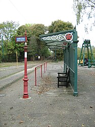 Preserved tram shelter.