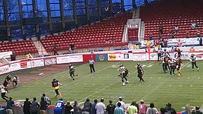 Triangle Torch (black jerseys with red and yellow accents) vs. Lehigh Valley Steelhawks (gold jerseys with black accents) during a game at Dorton Arena in Raleigh, North Carolina, March 25, 2016 Triangle Torch vs Lehigh Valley Steelhawks 3.jpg