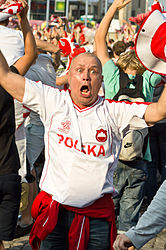 English: UEFA Euro 2012, Fanzone in Warsaw: A Polish supporter expressing his happiness after the goal shot by Robert Lewandowski in Poland vs Greece match. Polski: Radość po zdobyciu bramki przez Roberta Lewandowskiego w meczu Polska-Grecja. UEFA Euro 2012, Warszawa, Strefa Kibica.