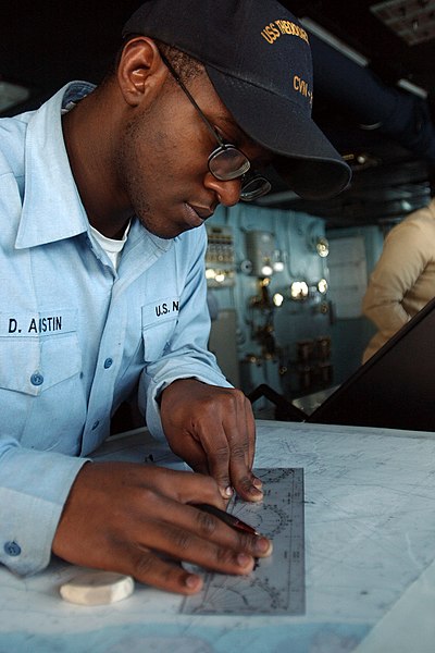 File:US Navy 051113-N-6484E-001 Quartermaster Seaman Dampier Austin plots the ship's coordinates during watch on the bridge aboard the Nimitz-class aircraft carrier USS Theodore Roosevelt (CVN 71).jpg