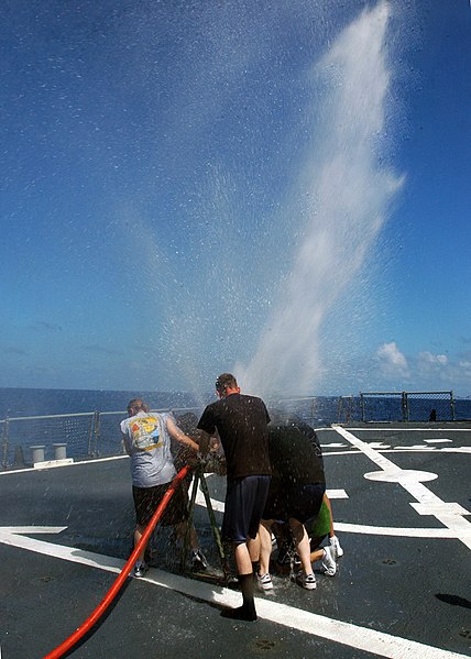 File:US Navy 071130-N-4014G-115 Sailors aboard the guided-missile destroyer USS Porter (DDG 78) conduct a pipe patching exercise on the flight deck during Porter's Damage Control Olympics.jpg