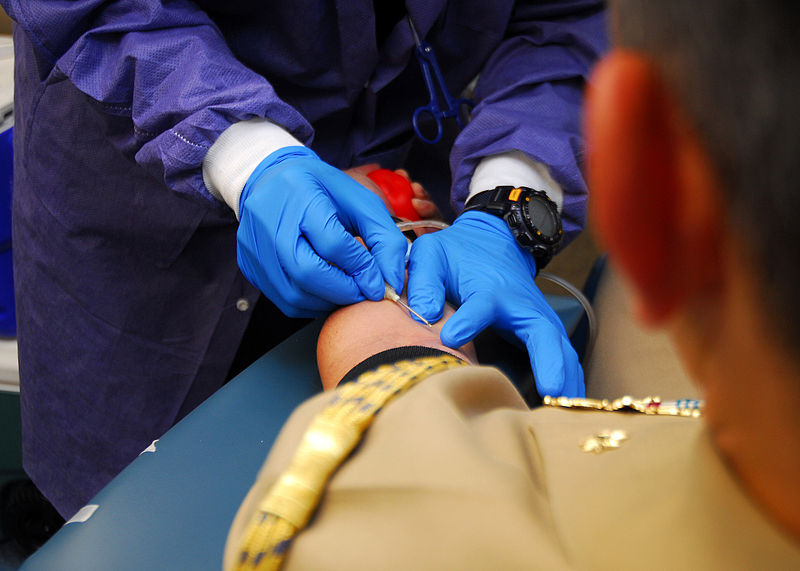 File:US Navy 081106-N-7668G-047 Lt. Cmdr. Eddie Robles, executive officer of Commander, Submarine Force (COMSUBFOR), donates blood to the Armed Services Blood Program (ASBP) at Seabee Plaza on Naval Support Activity, Norfolk.jpg