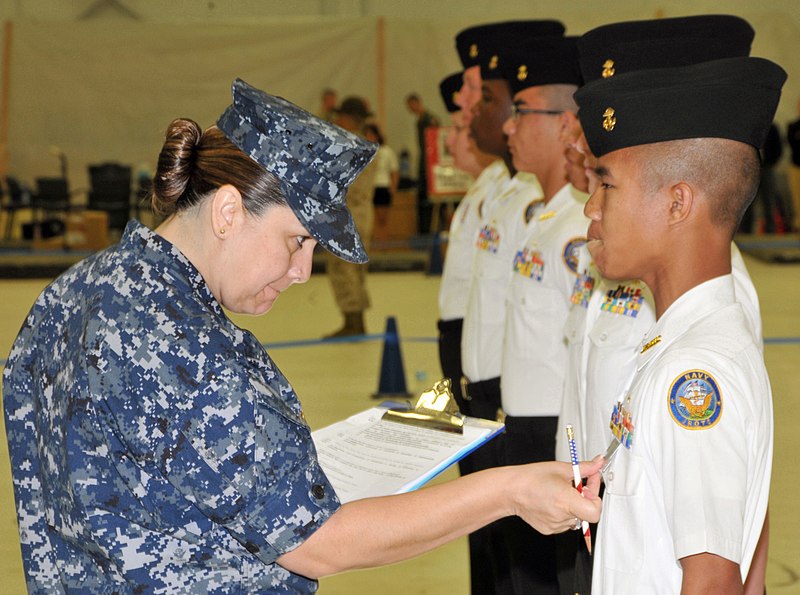 File:US Navy 100410-N-8848T-846 Senior Chief Yeoman Patricia Arnold measures the ribbons of a Navy Junior ROTC cadet from Centennial High School.jpg