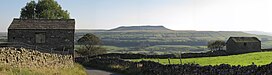 View of Addlebrough framed by old barns (geograph 2622551).jpg