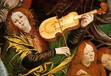 Fresco of a man holding a yellowish string instrument to his neck and bowing