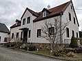 Residential building with workshop building