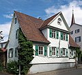 1=House with sheet metal plates facades in Schöckingen, German Federal State Baden-Württemberg.}