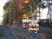 A road sign in Yiddish (except for the word sidewalk) at an official construction site in the Monsey hamlet, a community with thousands of Yiddish speakers, in Ramapo, New York.