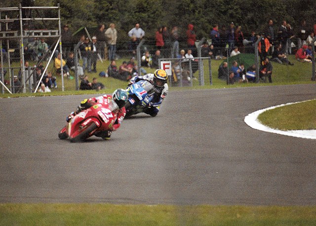 Youichi Ui and Emilio Alzamora, battling for the lead in the 125cc race. Ui won and Alzamora finished second.