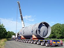 Goldhofer THP-SL hydraulic modular trailer with oversize load being pulled by Mercedes-Benz Actros ballast tractor via drawbar 0168 2019-03 Goldhofer THP-SL.jpg