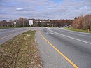 Westbound MD 228 approaching its continuous-flow intersection with MD 210 in Accokeek