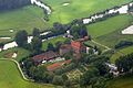 Schloss Oberwerries ist ein Wasserschloss in den Lippeauen bei Heessen, Hamm, Nordrhein-Westfalen, Deutschland. Das Bild entstand während des Münsterland-Fotoflugs am 1. Juni 2014. Hinweis: Die Aufnahme wurde aus dem Flugzeug durch eine Glasscheibe hindurch fotografiert.