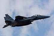 An F-15E Strike Eagle, tail number 01-2003, taking off from RAF Lakenheath in England. The aircraft is assigned to the 494th Fighter Squadron.