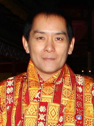 Image: 4th King of Bhutan, HM Jigme Singye Wangchuck at a Royal Banquet, at the Taschichhodzong, in Thimphu, Bhutan