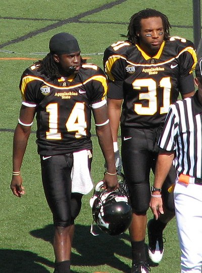 Edwards (#14) with Pierre Banks (#31) in 2008.