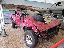 The severely damaged Toyota Hilux used in the destruction test Beaulieu National Motor Museum, Hampshire (460903) (9454847609).jpg