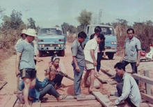 Buangam villagers are repairing the bridge on the main road of village entrance.png