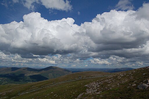 Cairngorm mountains with cumulus clouds