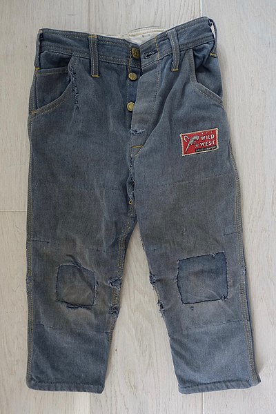 File:Children's clothing in Norway in the 1950s-1960s. Trousers (jeans) for young boys. "WILD WEST Dale-Sanfor" brand. Worn, mended DSC02605.jpg