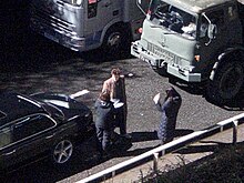 Ryan and Tennant reviewing the script before filming in Butetown at the Queen's Gate Tunnel on 28 January 2009. David Tennant and Michelle Ryan.jpg
