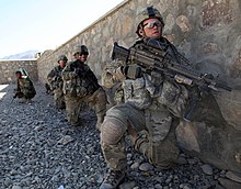 10th Mountain Soldiers during an operation in Logar Province. Defense.gov News Photo 101113-A-6521C-059 - U.S. Army soldiers with Charlie Troop 3rd Squadron 89th Cavalry 4th Infantry Brigade Combat Team 10th Mountain Division wait for the order to.jpg