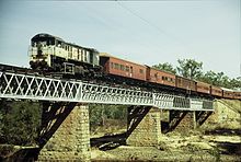 QR loco 1760 hauls a special train on the Mareeba-Almaden section of the Mungana line, September 1989 Dia 0377.jpg