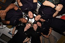 Expedition 64 crew gathers for a New Year's Day portrait inside the Cupola.jpg