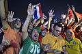 Fans of different origins celebrate at Rio de Janeiro Fan Fest, 2014.