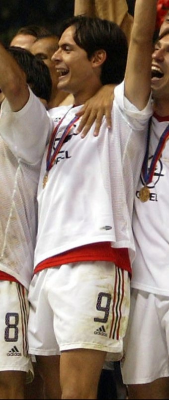 Inzaghi celebrates with Milan's teammates the triumph in the 2003 UEFA Champions League Final