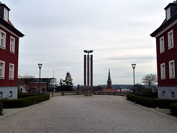 Railway monument in the Kiliansberg settlement on the station forecourt. The settlement and monument are heritage-listed