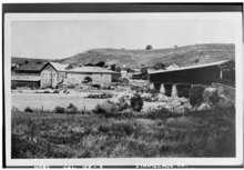 Knights Ferry covered bridge and the old Tulloch Mill (date unknown)
