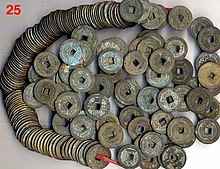 Cash coins found in Indonesia. Indonesian bulk strings of cash coins - Scott Semans.jpg