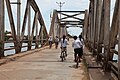 English: The old bridge across Teuk Chhou at the town Kampot, Cambodia