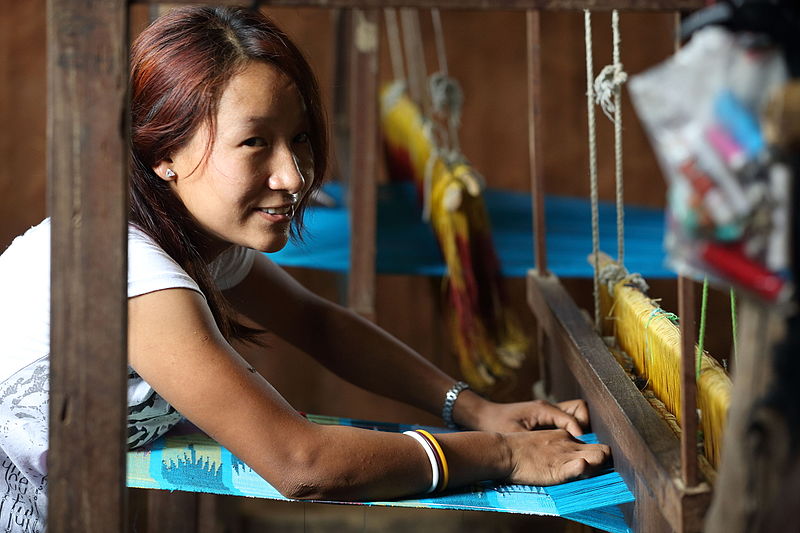 File:Kesu Magar weaving cloth at a MEDEP supported business, Triyuga Municipality, Bokse, Udayapur, NEPAL. (10706419796).jpg