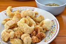 A bowl of pork rinds in Thailand Khaep mu.jpg