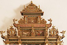 Very rare depiction of scenes from Revelation in an altar. Here in Kolby Church, Denmark, 1550. KolbyKircheD7Altar.jpg