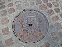 Manhole cover depicting the city's coat-of-arms