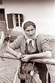 Lepejeva žena, ki je za partizansko bolnico Jesen pekla kruh v domači peči 1961.jpg