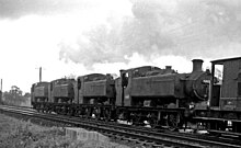 Four bank engines pushing a heavy freight train up the Lickey Incline Lickey Bank geograph-2610874-by-Ben-Brooksbank.jpg