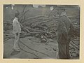 Mt. Pelee- (Two men and body, result of eruption of Mt. Pelee on Martinique) (4555061882).jpg