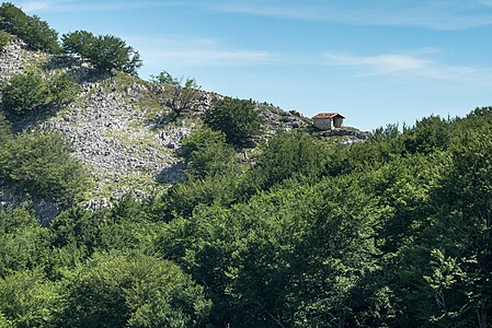 Santikurutz Chapel (Holy Cross) on the way up to the summit of Orisol, almost on the summit and over beech woodland. Álava, Basque Country, Spain