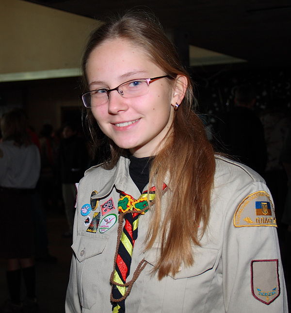 Young woman in plast uniform