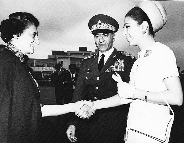 Shah Mohammad Reza Pahlavi and Shahbanu Farah Pahlavi of Iran being received by prime minister Indira Gandhi at New Delhi airport, 1970