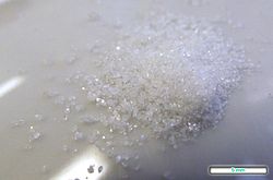 For comparison: The pure drug is a colourless crystalline powder.
